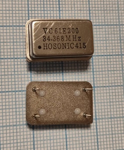Кварцевый генератор 34.368 M - 34368 VC-61E200 VCXO FULL DIL-14 5B TTL/CMOS HOSONIC