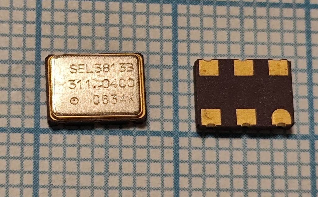 Кvарцеvый генератор 311040 SMD 07-05-M6 3.3v LVPECL Saronix SEL3813B11.040
