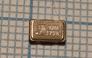 Кварцевый генератор 7372.8 КГц - S1633E-7.3728-T SMD0503M4-4 3.3в CMOS Low Jitter XO